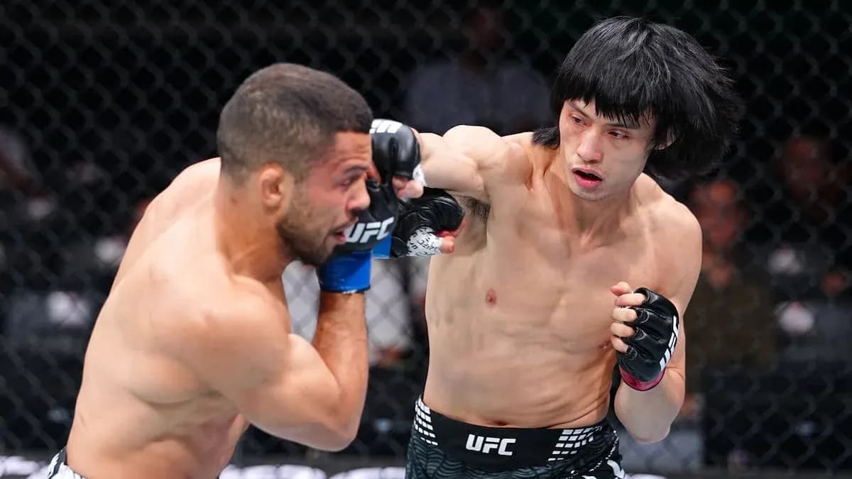 Fighter delivering a punch during UFC match
