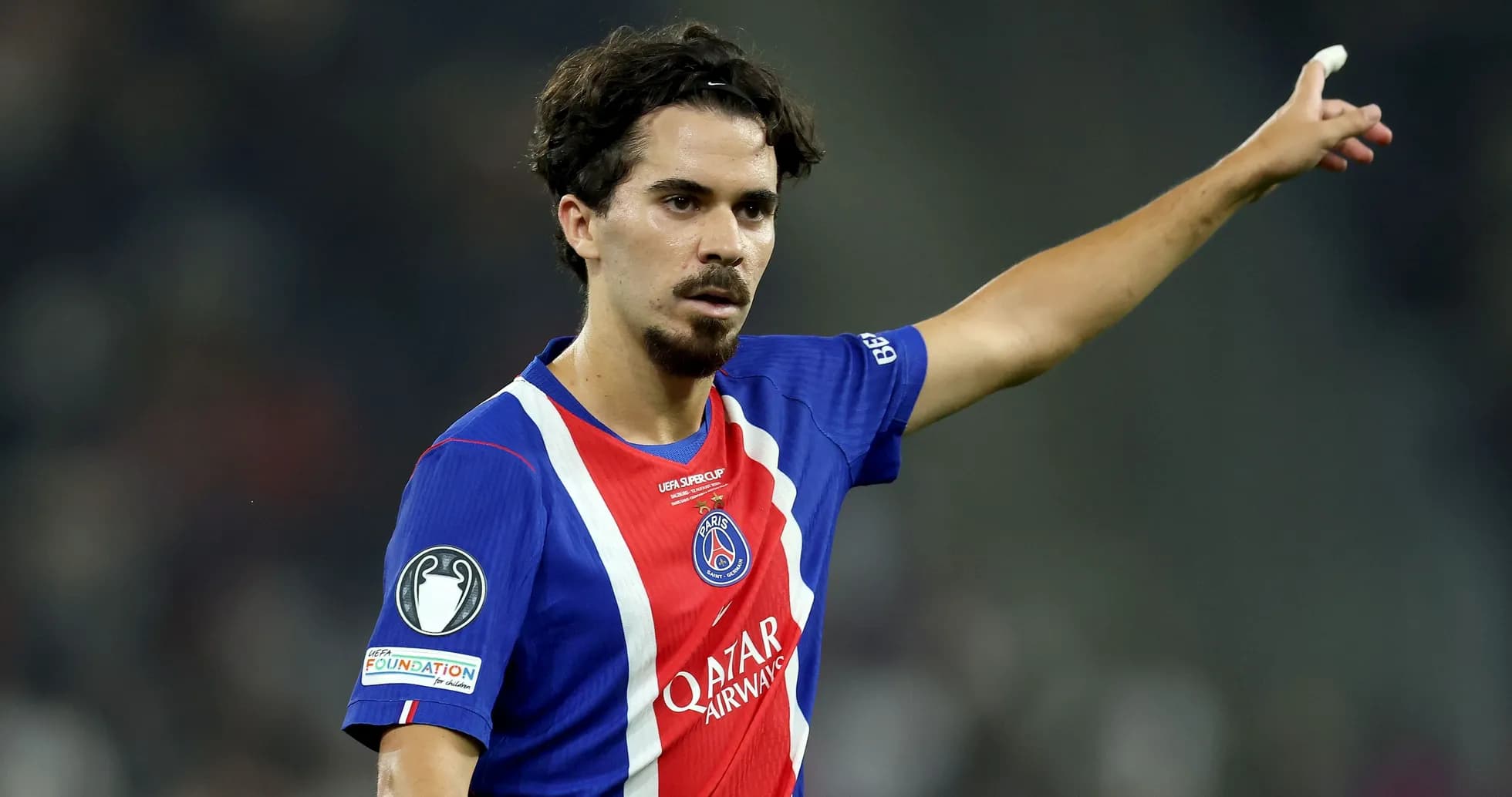 Player gesturing during UEFA Super Cup match