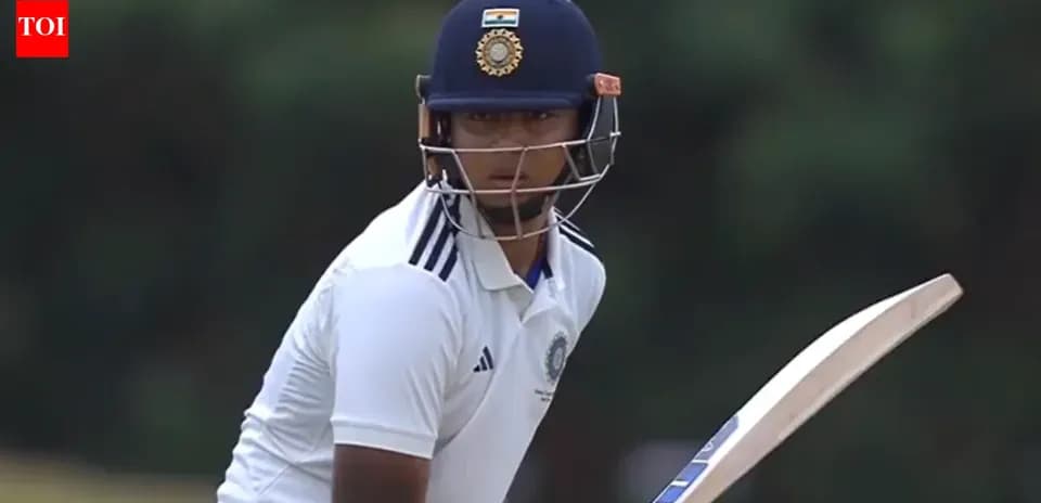 Batsman preparing to face a delivery in cricket match