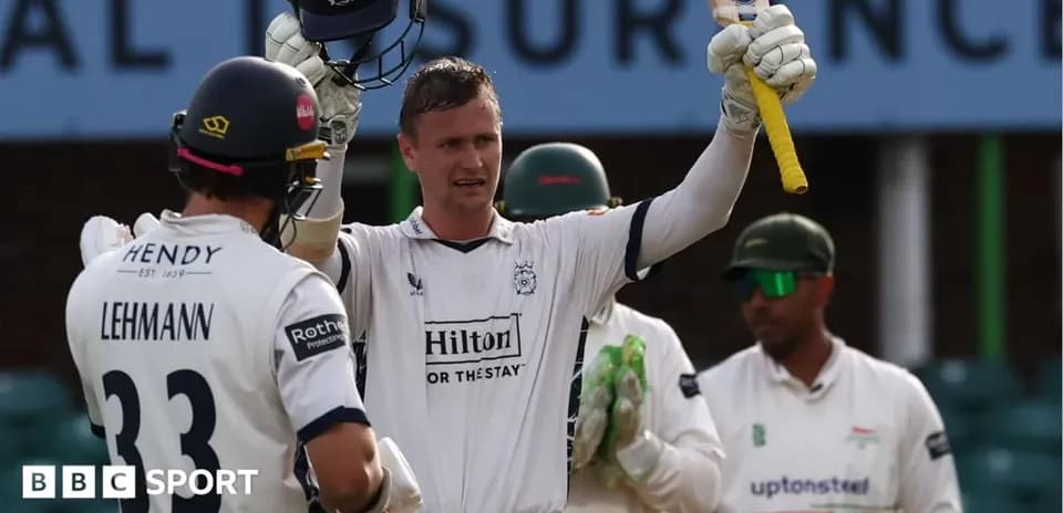 Batsman celebrating a milestone with teammates during match