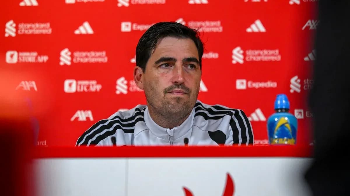 Manager at press conference with backdrop branding
