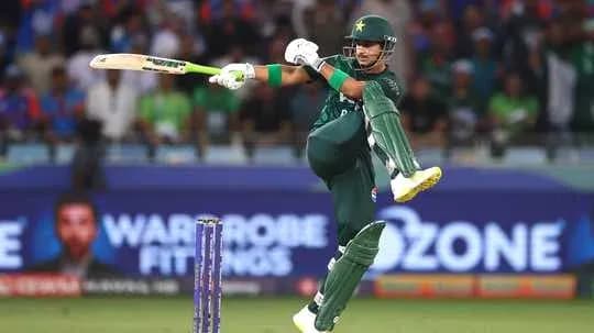Batsman hitting a ball during cricket match
