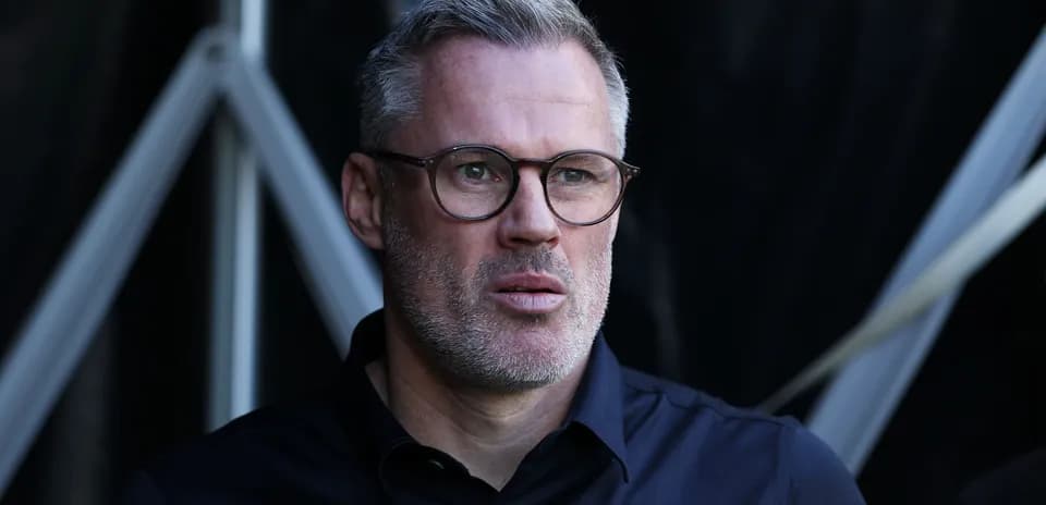 Man with glasses looking thoughtfully off-camera
