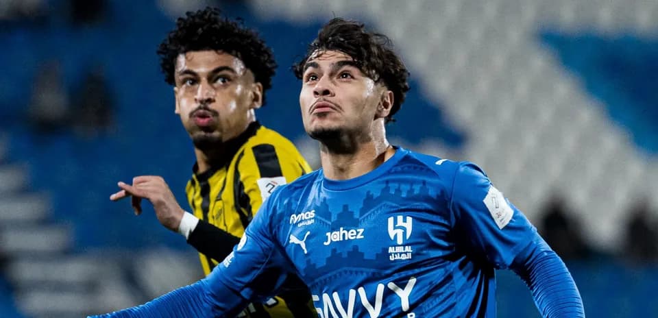 Players from Al Hilal and Ittihad during match action
