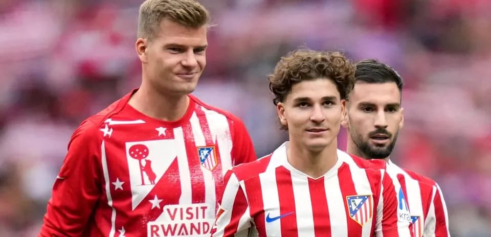 Three Atlético Madrid players in red and white kits