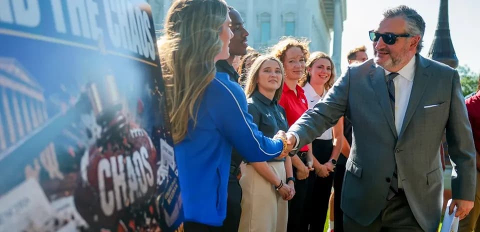 Man shaking hands with woman at outdoor event