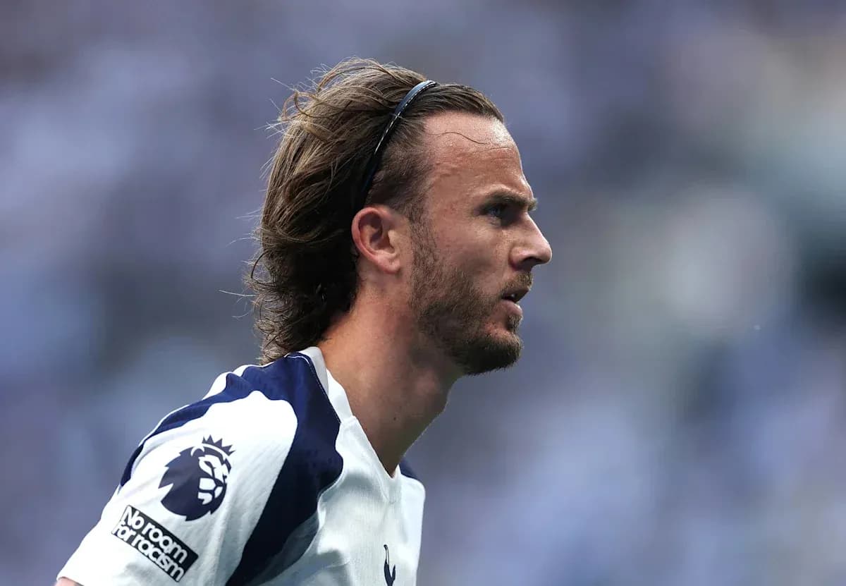 Player in Tottenham kit during match action