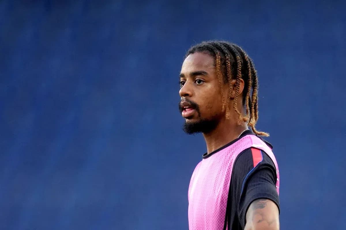 Player in training bib during warm-up session