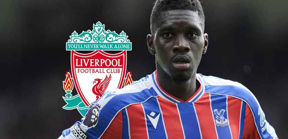 Player in Crystal Palace kit with Liverpool logo