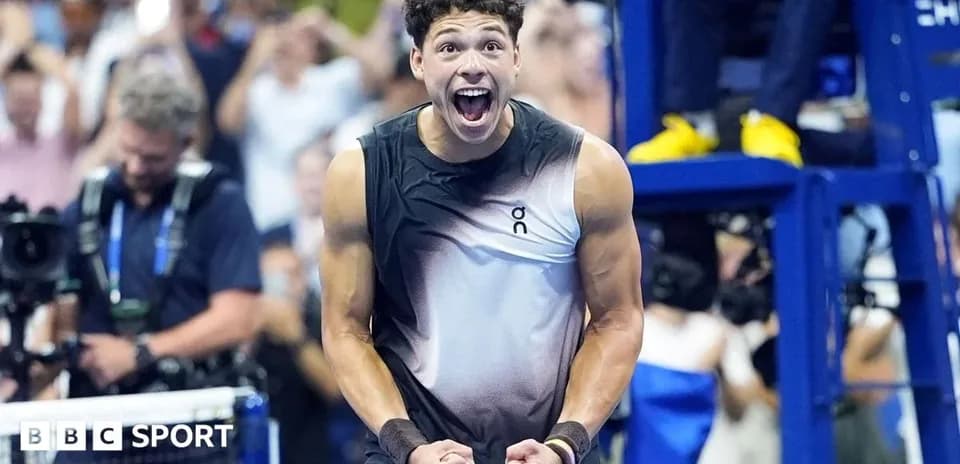 Tennis player celebrating victory with excitement