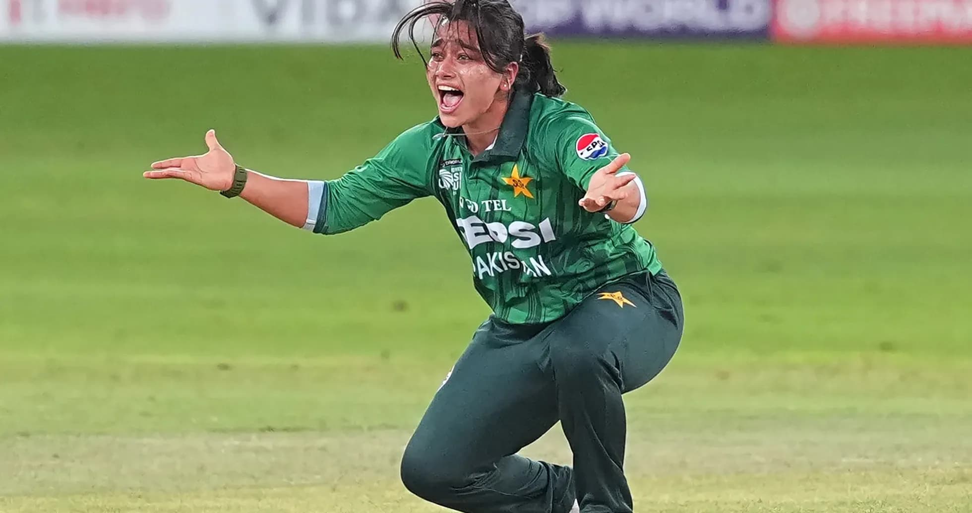 Cricketer celebrating a wicket during match