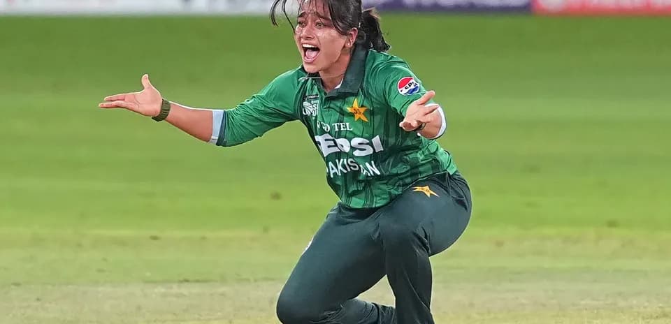 Cricketer celebrating a wicket during match