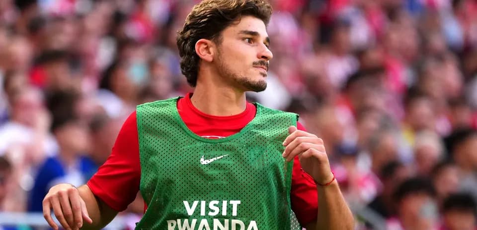 Player warming up on sidelines during match