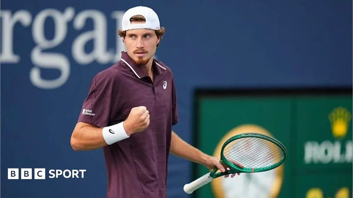 Tennis player celebrating during a match Tennis player celebrating during a match