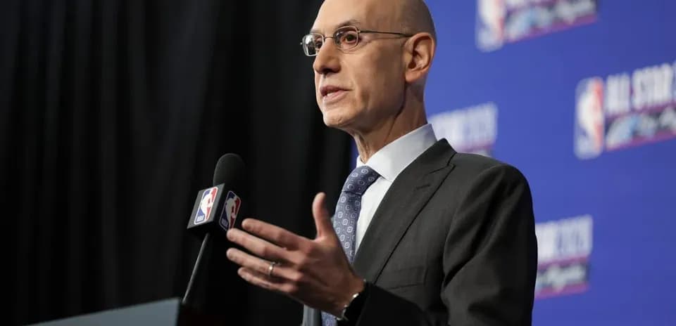 NBA commissioner speaking at press conference podium