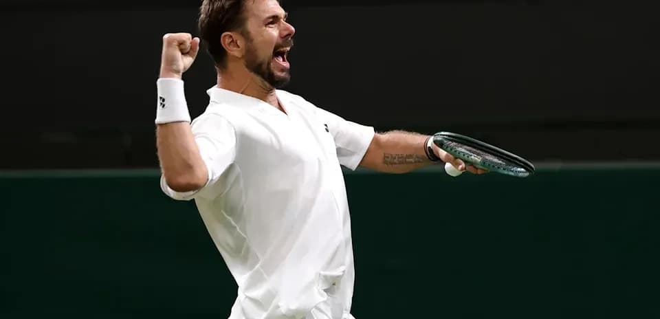 Tennis player celebrating victory on the court