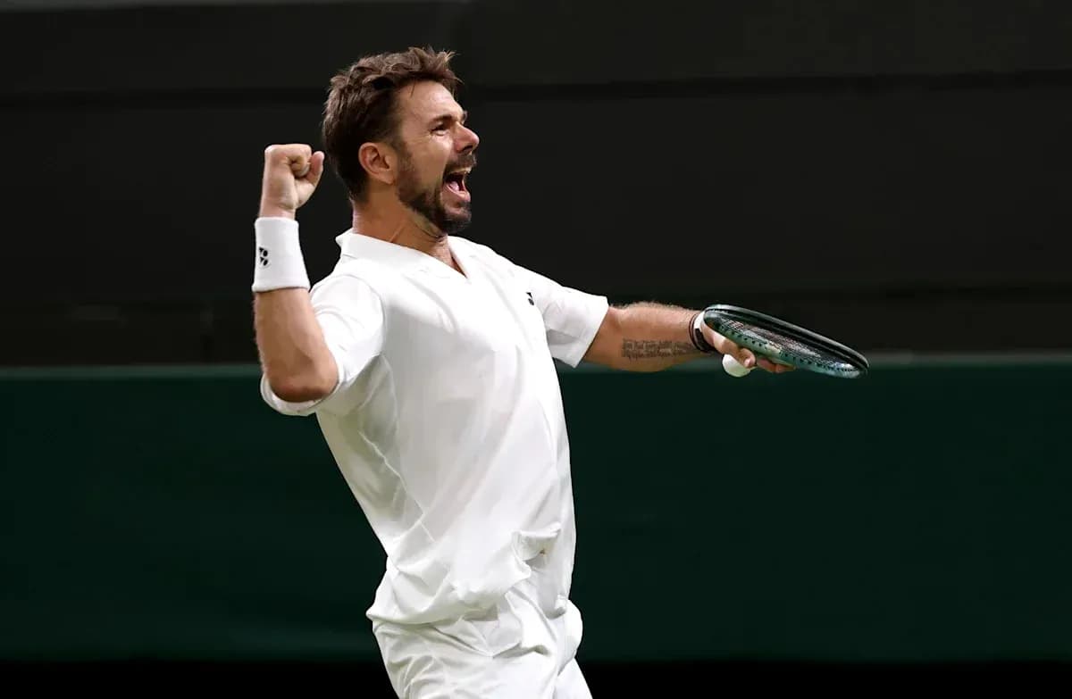 Tennis player celebrating victory on the court