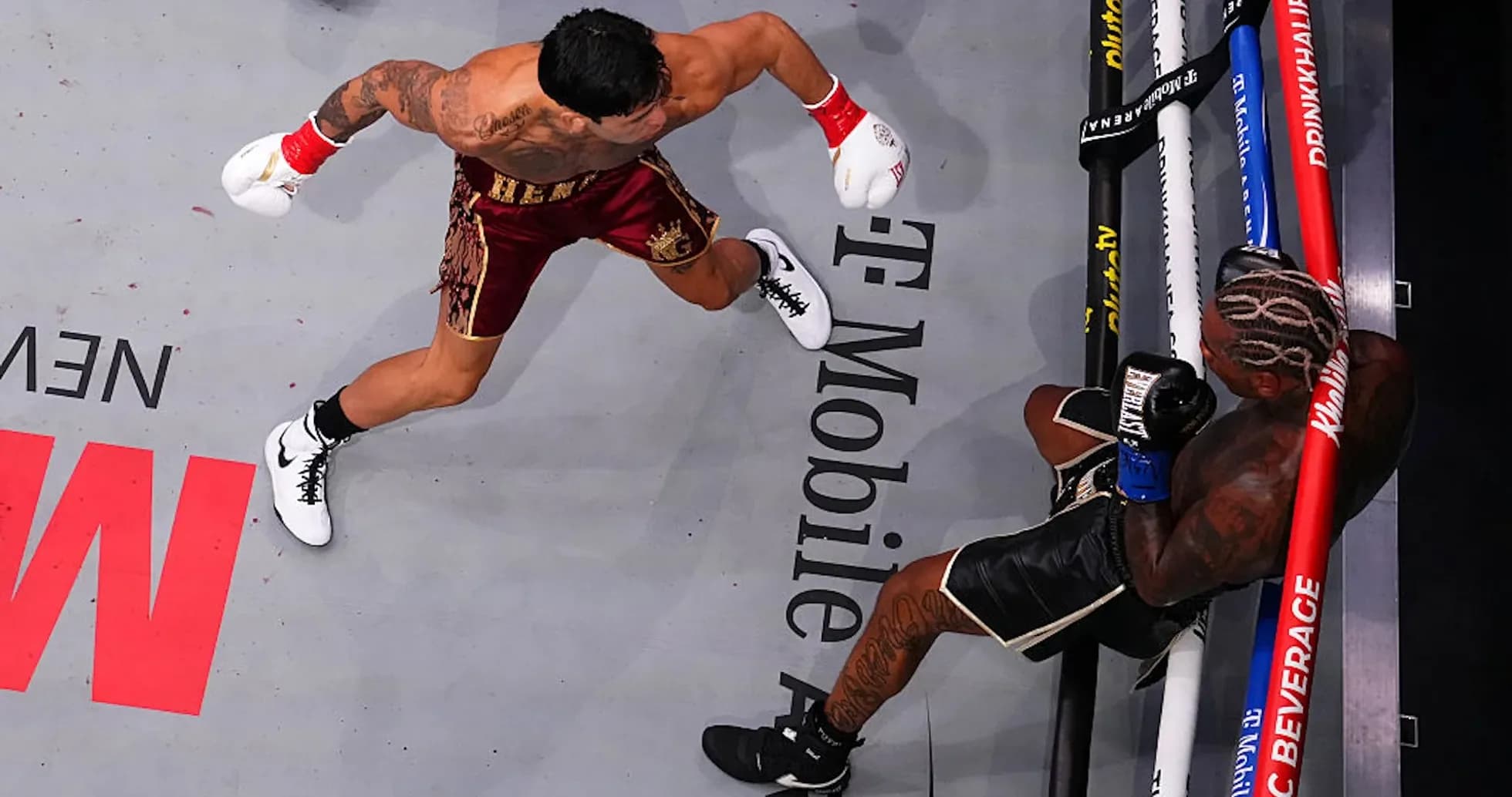 Boxer delivering a punch in the ring