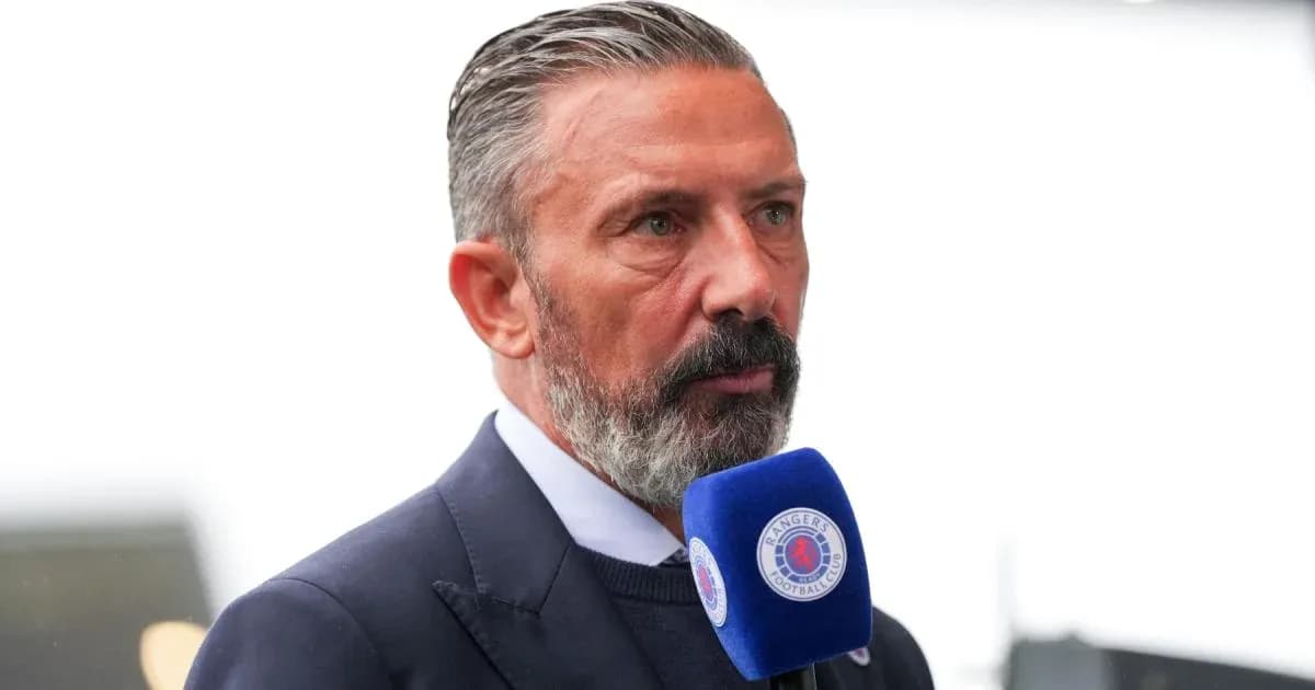 Person speaking into a microphone at event Person speaking into a microphone at event