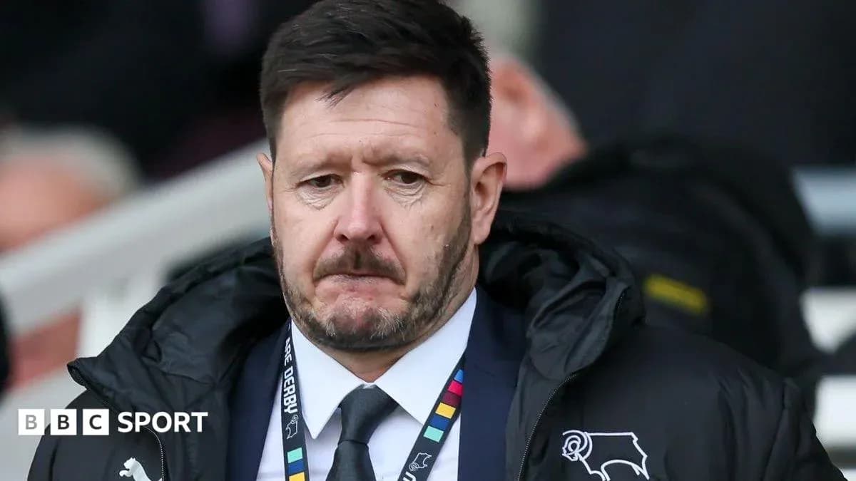 Manager looking serious during match on sidelines Manager looking serious during match on sidelines