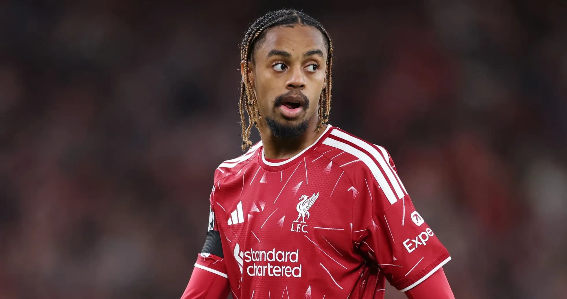 Player in Liverpool jersey during a match Player in Liverpool jersey during a match