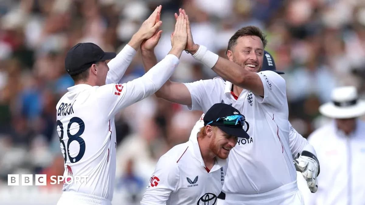 England cricket team celebrating a wicket on field England cricket team celebrating a wicket on field