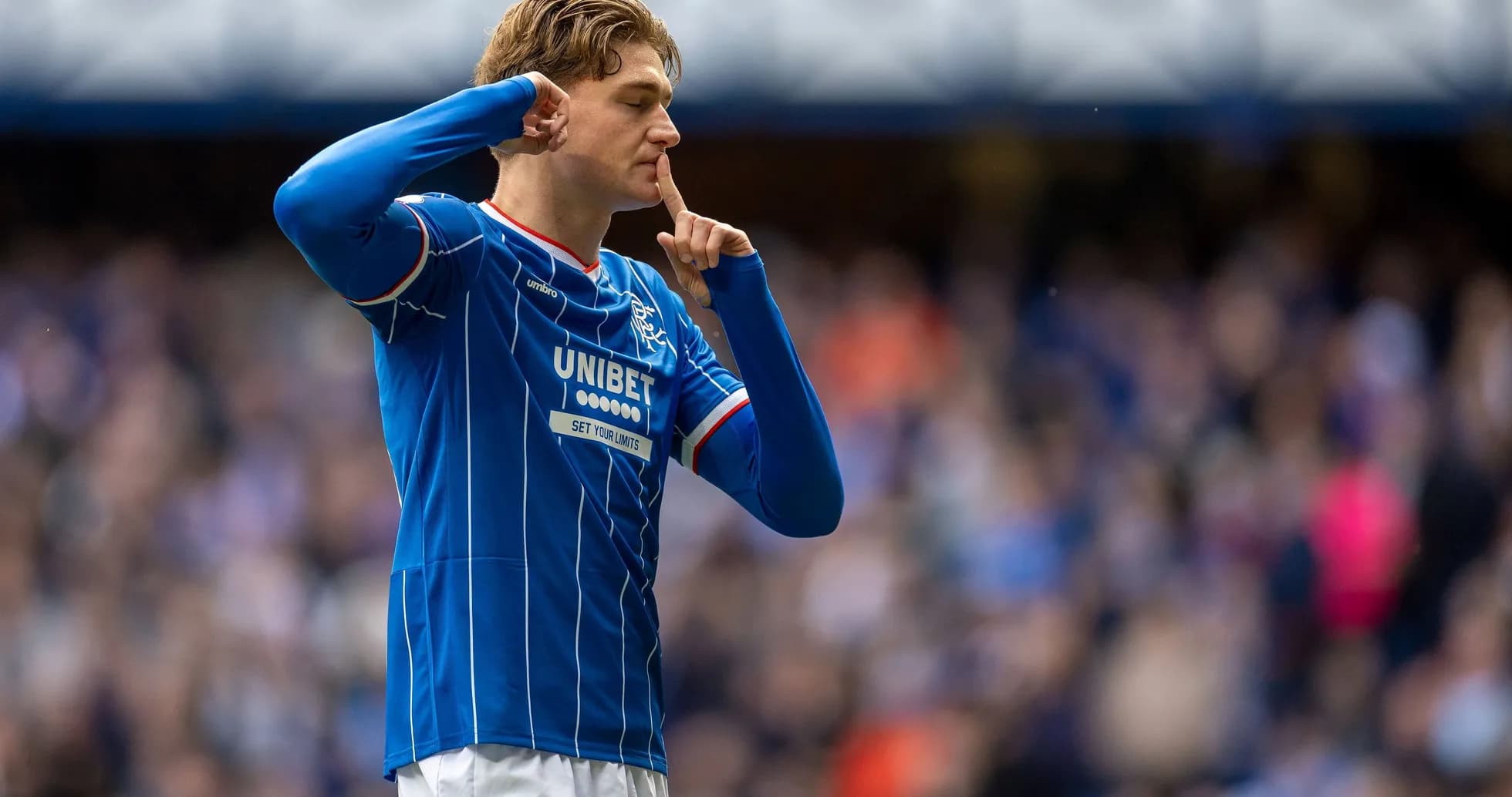 Player celebrating with finger on lips gesture Player celebrating with finger on lips gesture
