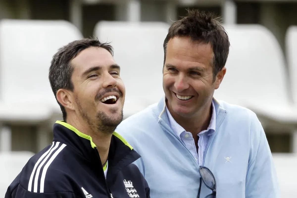 Two men laughing together at a cricket venue Two men laughing together at a cricket venue