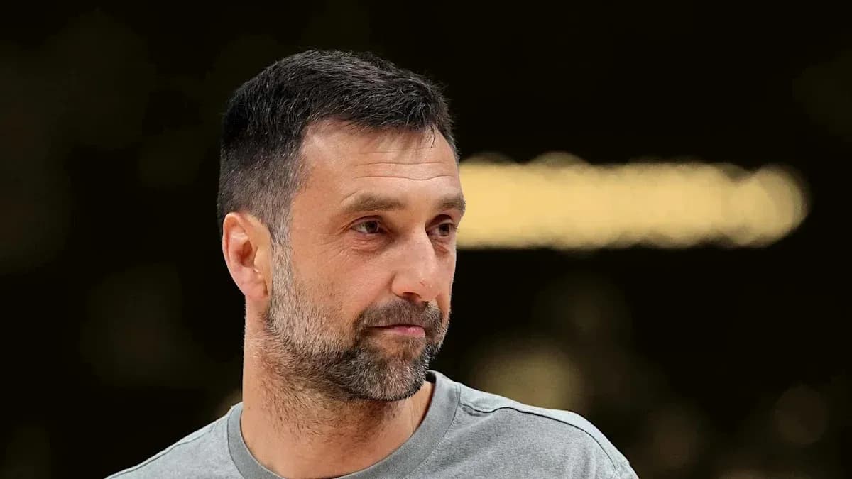 Man with short hair and beard in sports attire Man with short hair and beard in sports attire