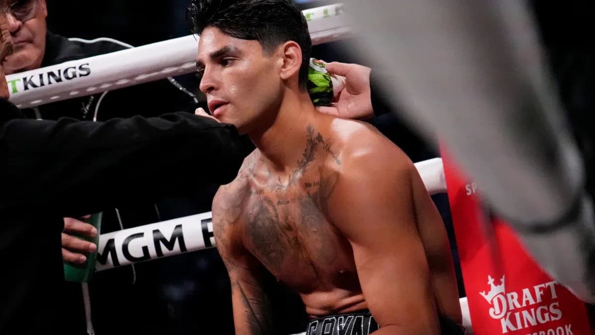 Boxer receiving assistance in corner of ring Boxer receiving assistance in corner of ring