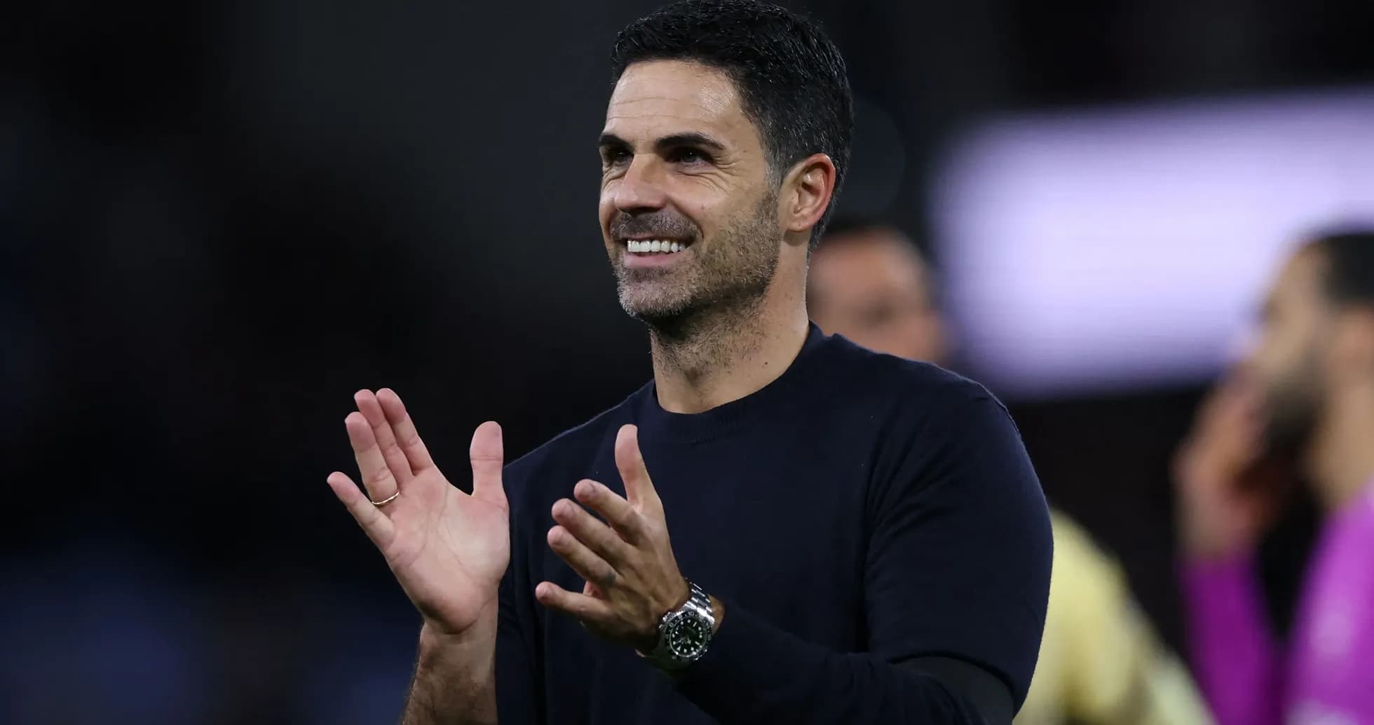 Manager applauding during a football match Manager applauding during a football match