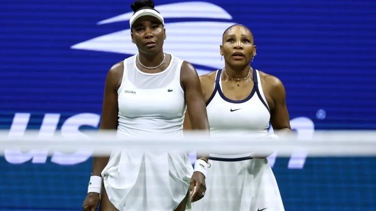 Venus and Serena Williams during a doubles match Venus and Serena Williams during a doubles match