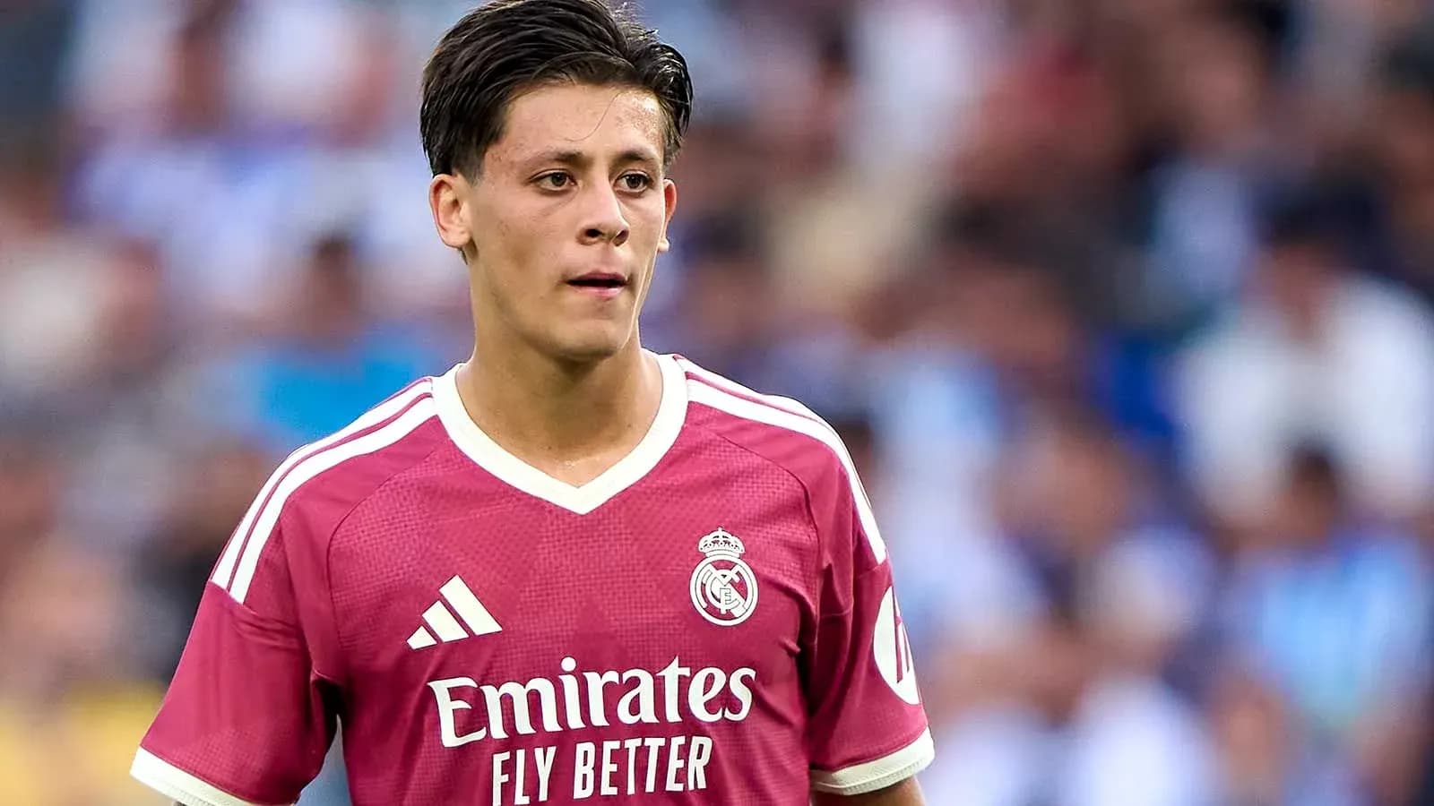 Player in pink Real Madrid jersey during match Player in pink Real Madrid jersey during match