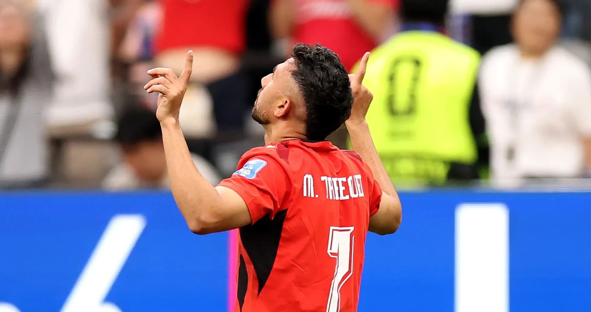 Player celebrating a goal during a match Player celebrating a goal during a match