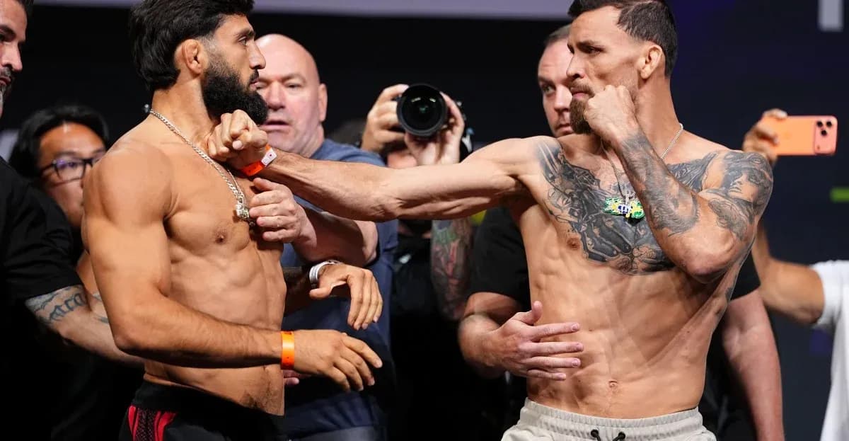 Two fighters facing off at weigh-in event Two fighters facing off at weigh-in event