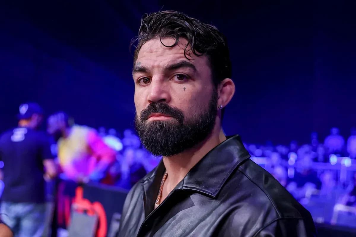 Man with beard in a crowd at an event Man with beard in a crowd at an event