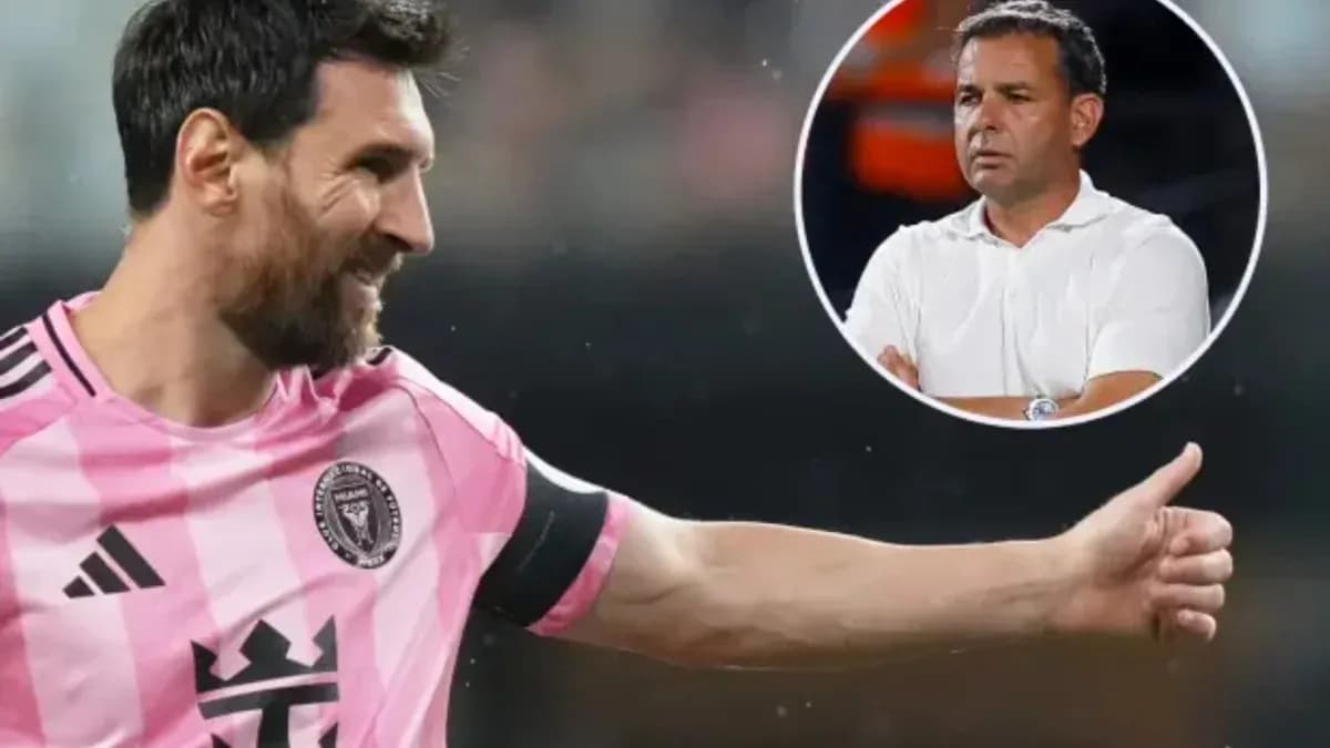 Lionel Messi celebrating with coach in background Lionel Messi celebrating with coach in background