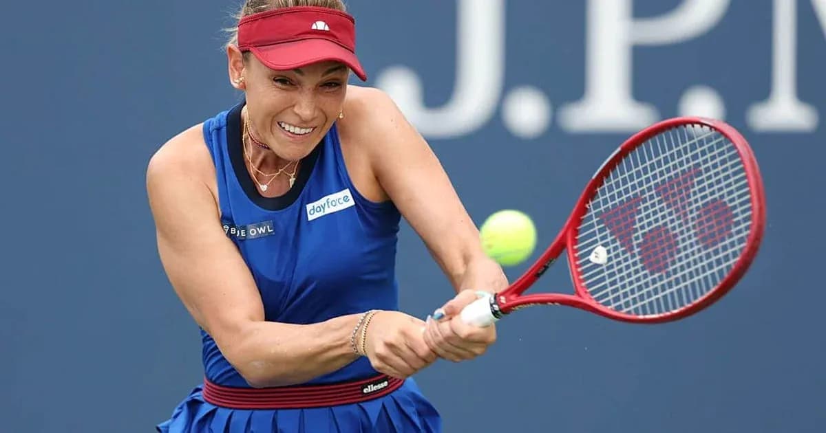 Player hitting a tennis ball during a match Player hitting a tennis ball during a match