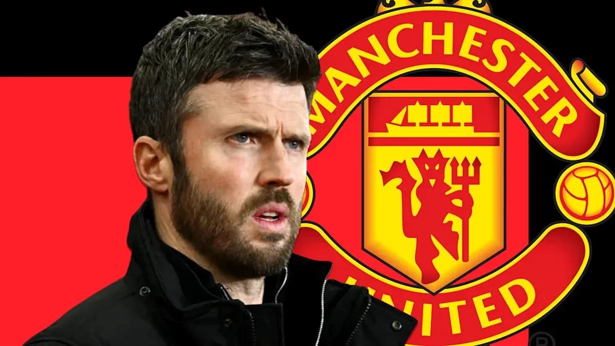 Coach in front of Manchester United logo background Coach in front of Manchester United logo background