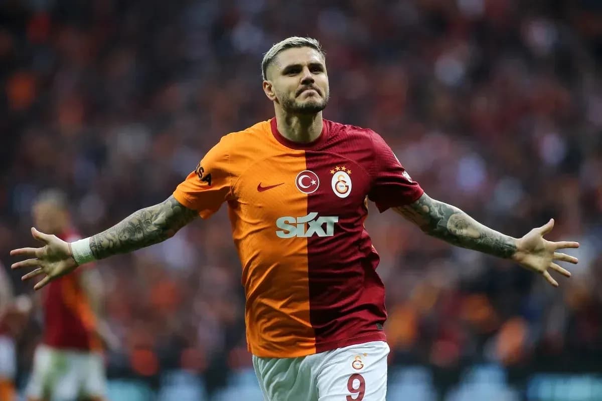Player celebrating a goal in Galatasaray jersey Player celebrating a goal in Galatasaray jersey