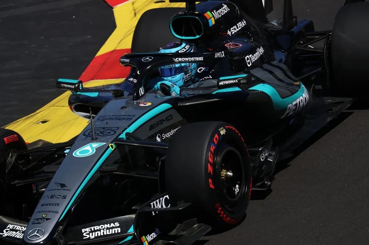 Mercedes Formula 1 car on racetrack corner Mercedes Formula 1 car on racetrack corner