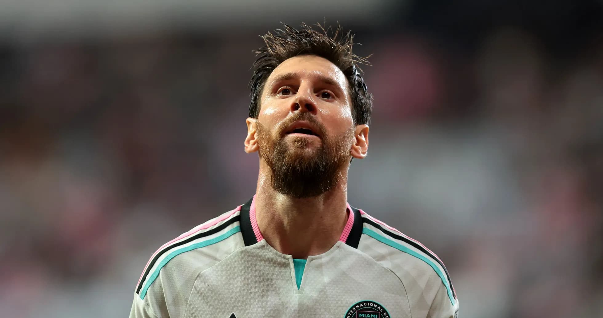Player in Miami jersey looking up during match Player in Miami jersey looking up during match
