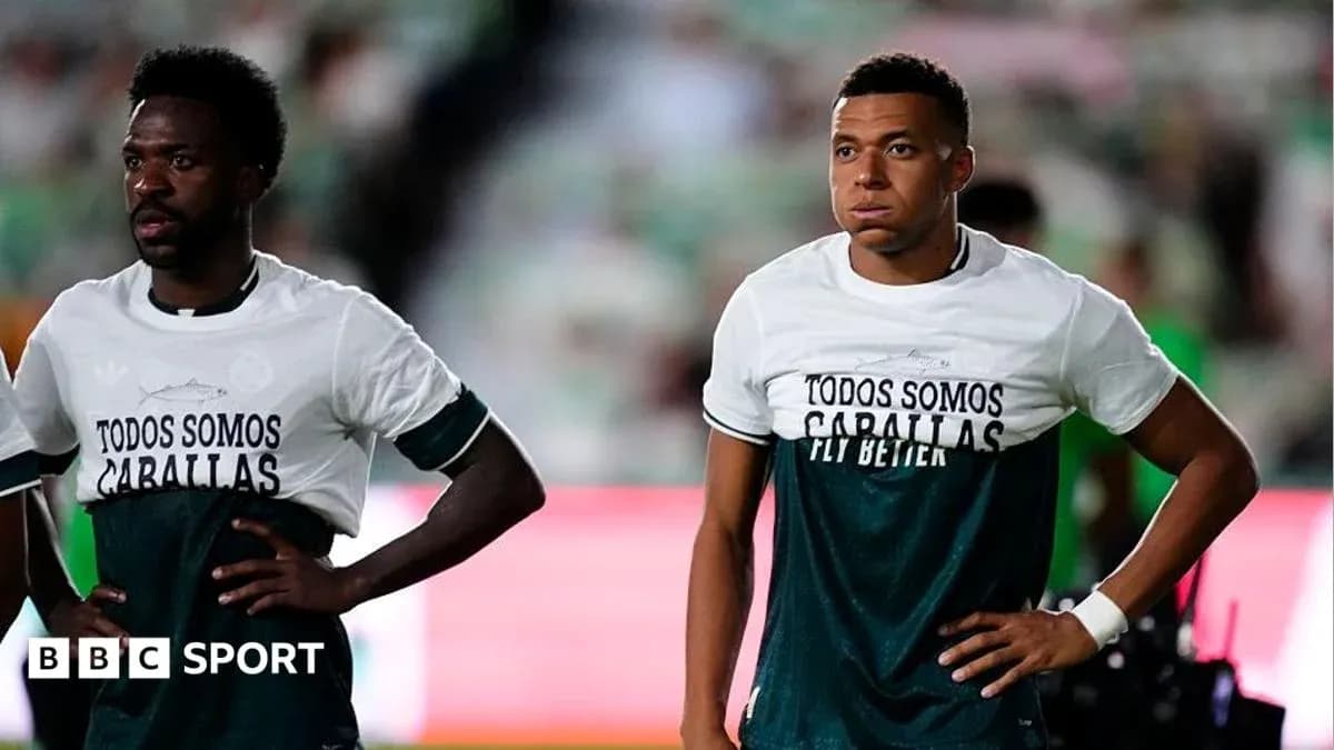 Players wearing warm-up shirts before the match Players wearing warm-up shirts before the match