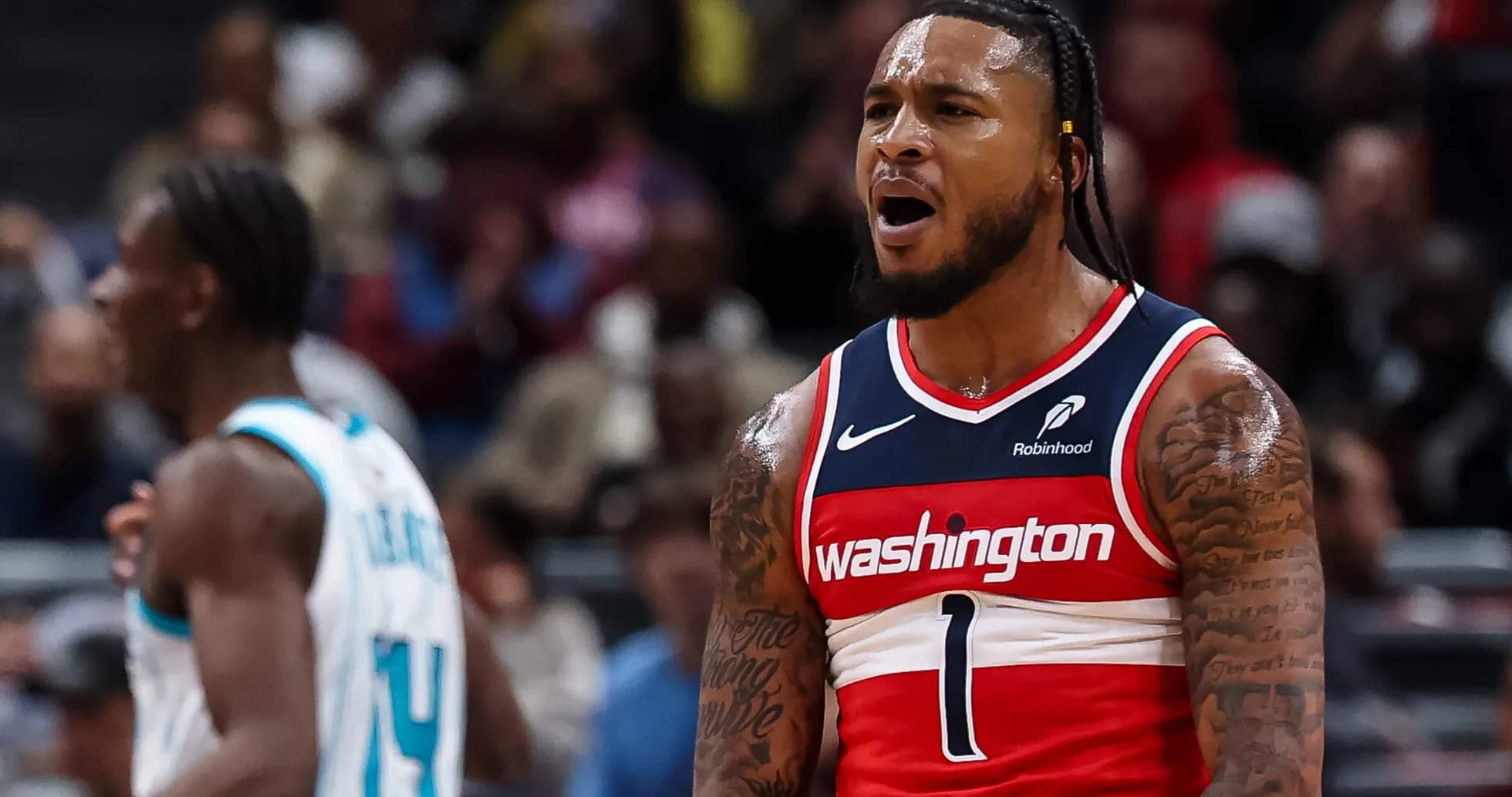 Player celebrating during a basketball game Player celebrating during a basketball game