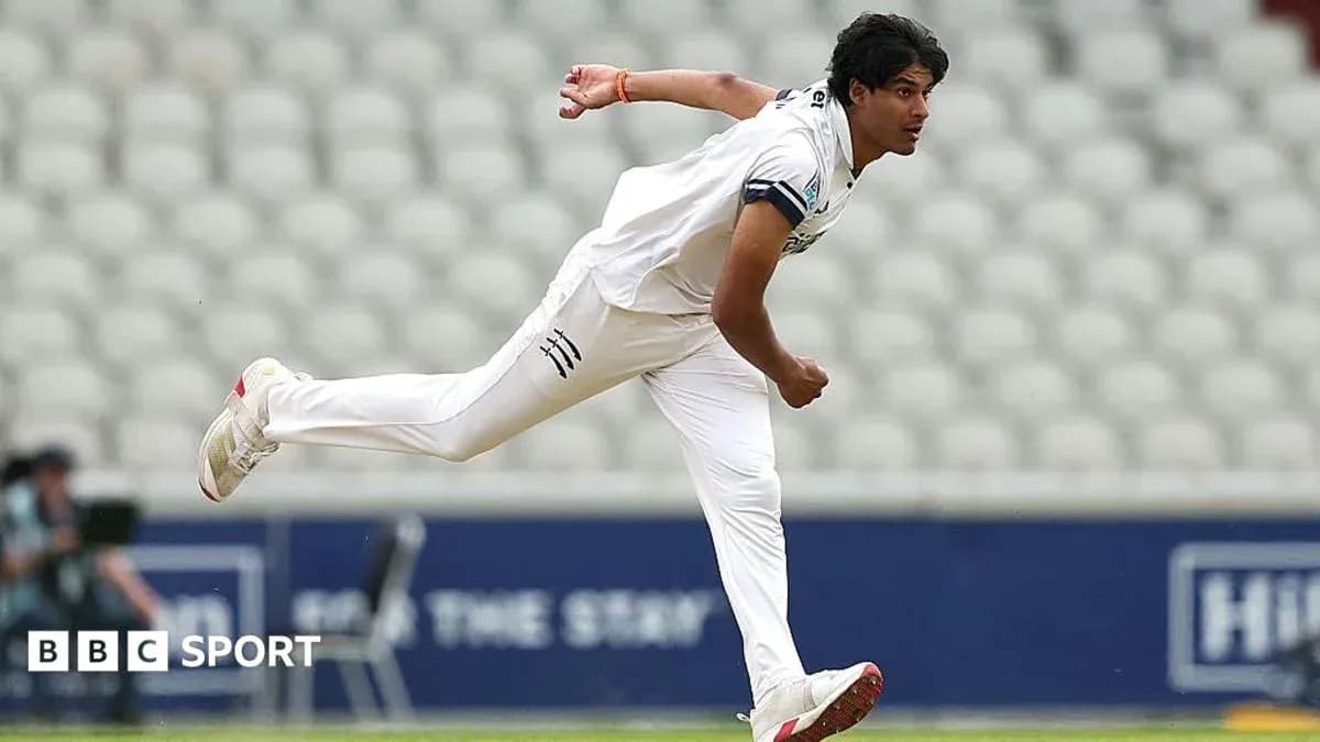 Cricketer bowling during a match on the field Cricketer bowling during a match on the field