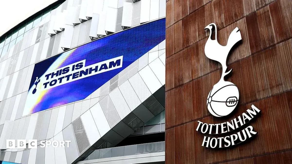 Tottenham Hotspur logo and banner outside stadium Tottenham Hotspur logo and banner outside stadium