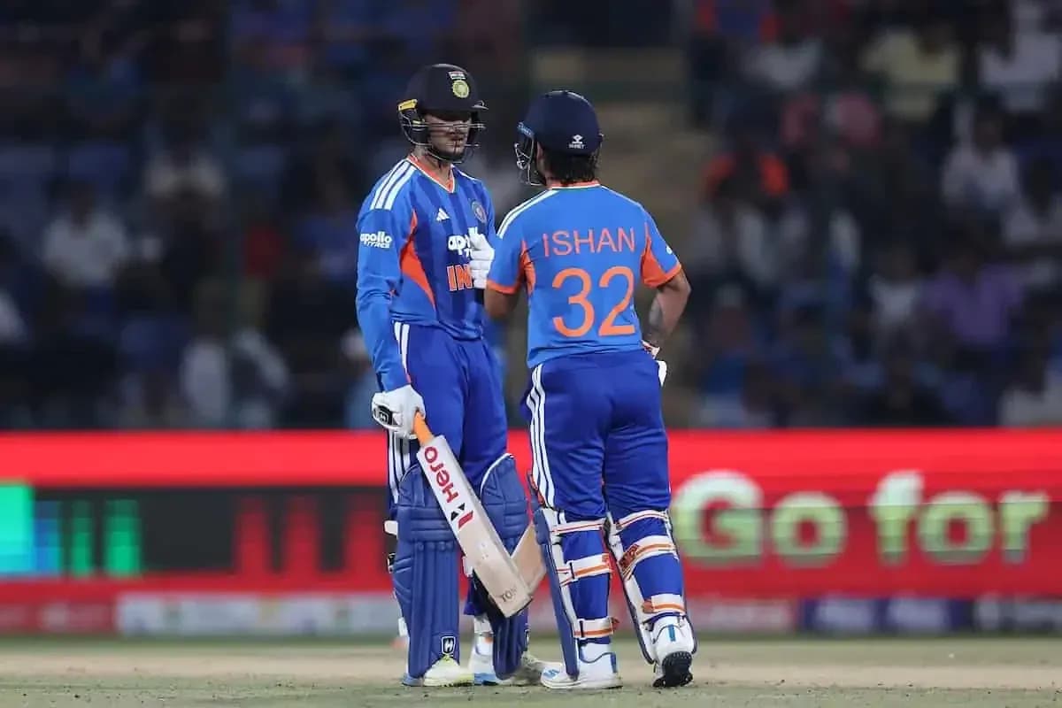 Two Indian cricketers discussing on the field Two Indian cricketers discussing on the field