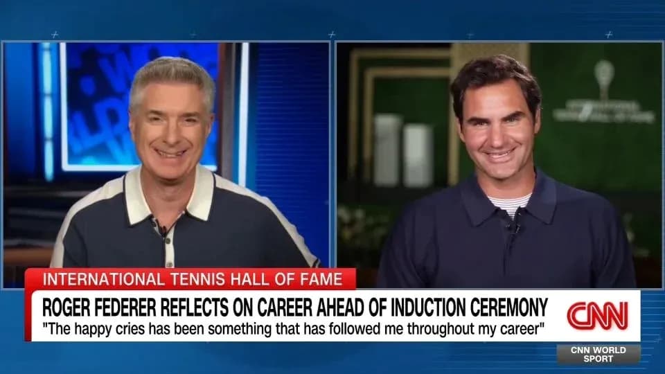 Roger Federer and interviewer discussing his career Roger Federer and interviewer discussing his career