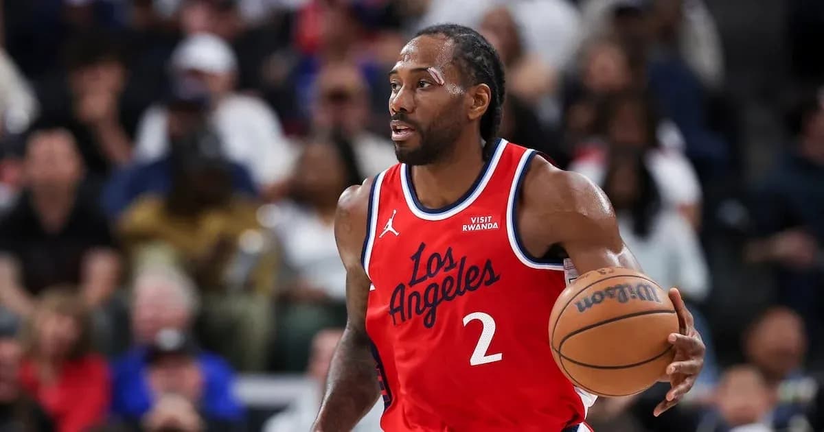 Kawhi Leonard dribbling basketball during game Kawhi Leonard dribbling basketball during game