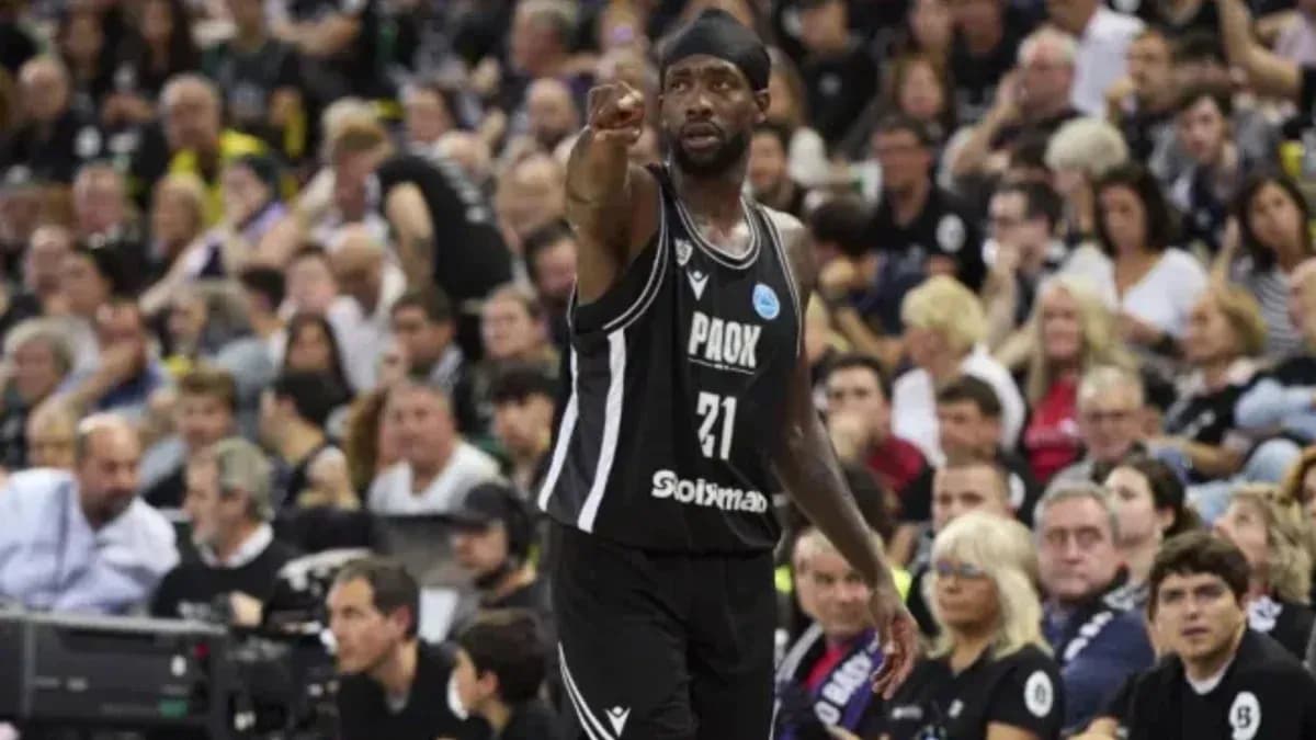 Player gesturing to the crowd during basketball game Player gesturing to the crowd during basketball game